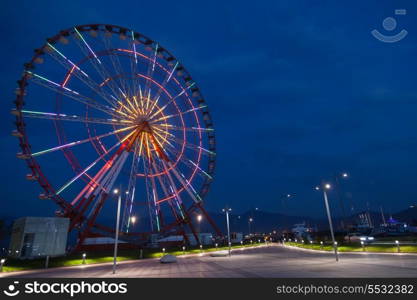 Ferris wheel and night park in Batumi, Georgia