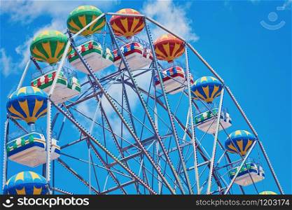Ferris Wheel over the Blue Sky. Ferris Wheel