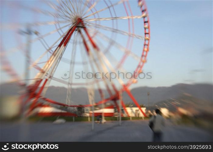 Ferris Wheel. Soft focus. Made with lens-baby.