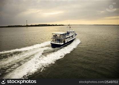 Ferry boat transporting passengers across Atlantic Ocean near Bald Head Island, North Carolina.