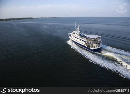 Ferry boat transporting passengers across Atlantic Ocean near Bald Head Island, North Carolina.