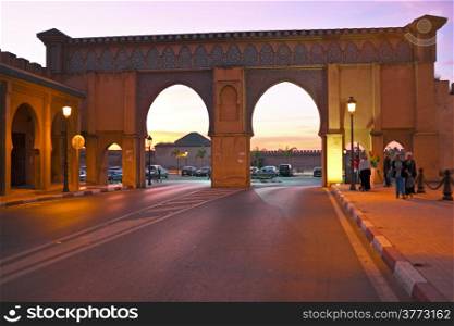 FES. MOROCCO - OCTOBER 15: Bab Boujelud Gate to the old medina in Fes at twilight in Fes, Morocco, Africa
