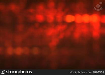 Festive abstract bokeh of red color background
