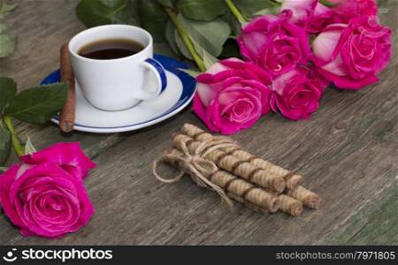 festive card coffee, linking of cookies and pink roses on each side, a festive still life on a subject flowers and drinks
