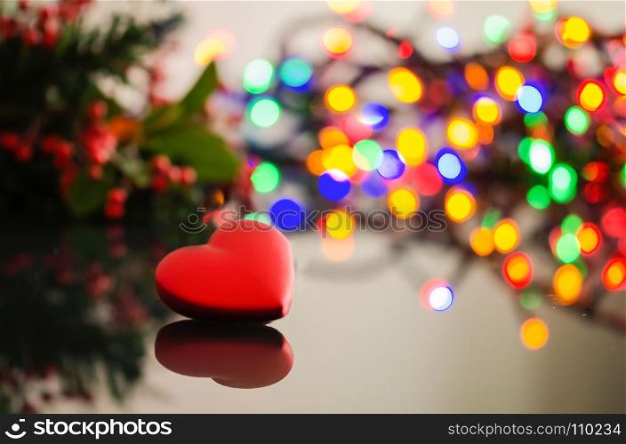 Festive Christmas background. Elegant abstract background with bokeh defocused lights and stars and heart