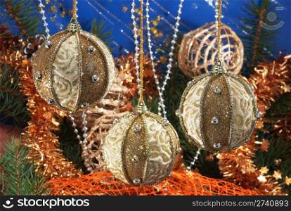 Festive Christmas composition with Christmas tree branch, holiday balls and other adornments