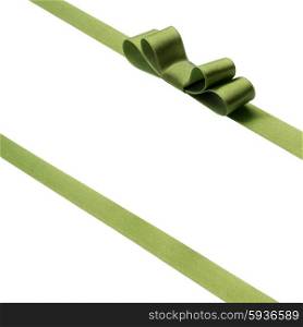 Festive green gift ribbon and bow isolated on white background