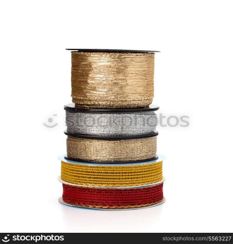 Festive ribbons stack isolated on white background