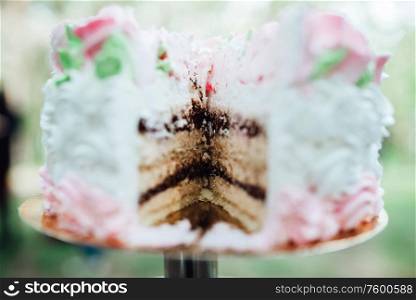festive wedding sponge cake with white icing cream