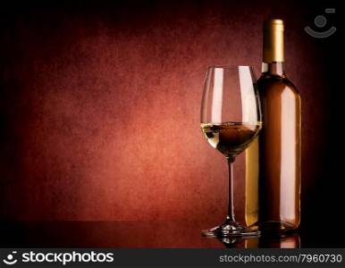 Festive white wine on a brown background