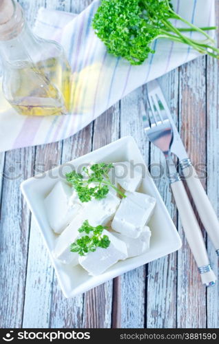 feta cheese in bowl and on a table