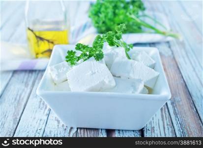 feta cheese in bowl and on a table
