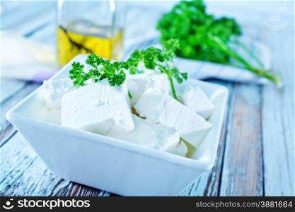 feta cheese in bowl and on a table