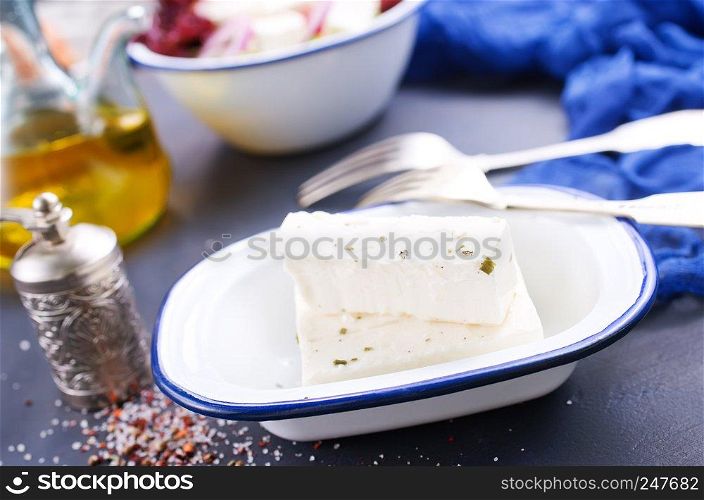 feta cheese in metal bowl on a table