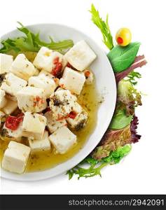 Feta Cheese With Olive Oil , Herbs And Fresh Salad Leaves