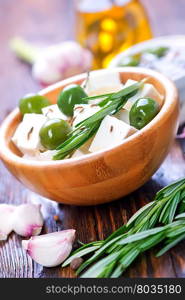 feta cheese with rosemary and green olives