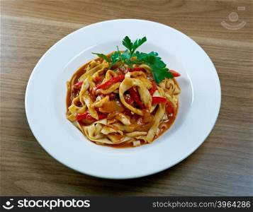 fettuccine with squid. italian pasta.