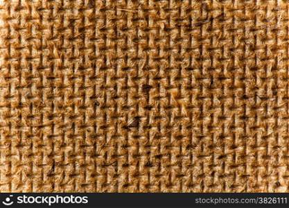 Fiberboard texture pattern, brown abstract background. Rough side of a piece of hardboard light vignette