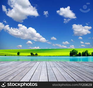 field on a background of the blue sky