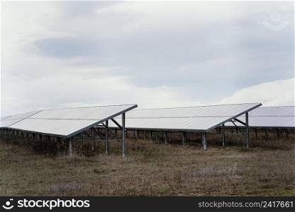 field with lots solar panels copy space
