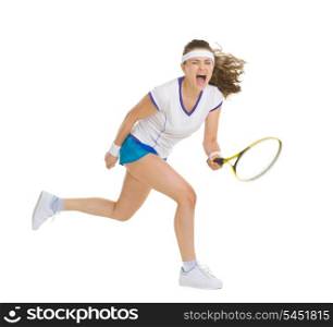 Fierce tennis player hitting ball