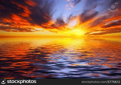 Fiery sunset over the sea in the tropics