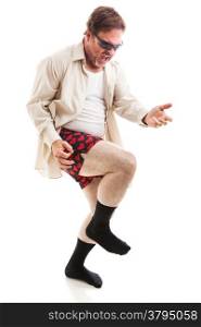 Fifty year old man in his underwear and sunglasses playing air guitar. Isolated on white.