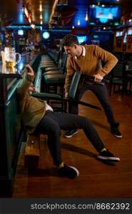 Fight in a pub. Angry guy pulling friend with chair. Aggression and conflict concept. Hooligans confrontation at sport bar. Fight in a pub, angry guy pulling friend with chair