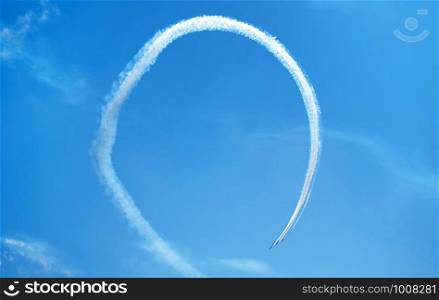 Fighter planes performing a perfect loop in formation very close to each other.. Fighter planes performing a perfect loop in formation.
