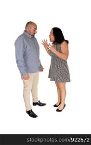 Fighting couple, the wife is shouting to her husband, raising her voice and he stands with his head down, isolated for white background