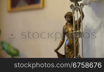 figural pendulum swing clock, bronze figure of a woman
