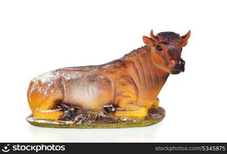 Figure of a big ox for the Nativity Potal isolated on a white background