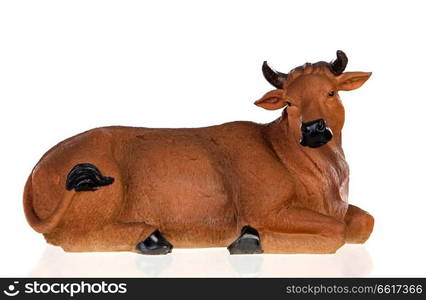 Figure of a big ox for the Nativity Potal isolated on a white background