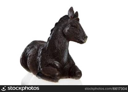 Figure of a mule for the Nativity Potal isolated on a white background