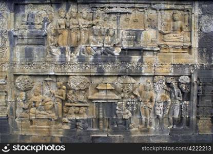 Figures and story on the wall in Borobudur
