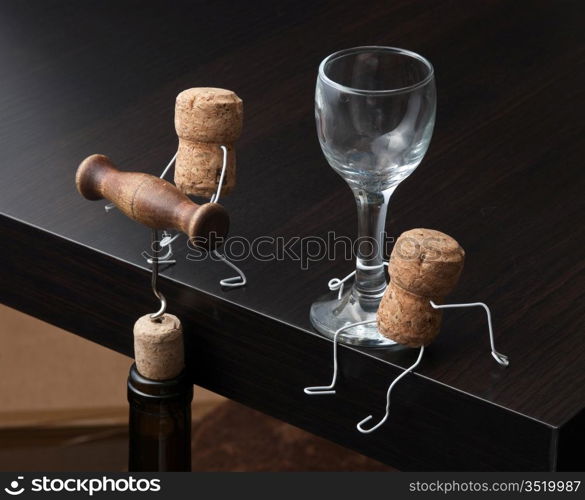 Figures from wine corks and bottle with the corkscrew