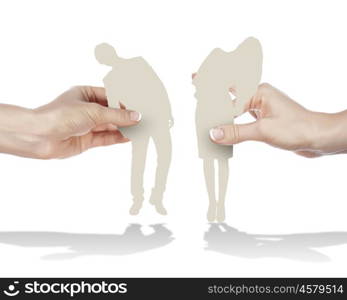 Figures of man and woman standing next to each other