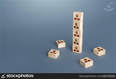 Figurine block tower with people. Hierarchical system. Company organization. Hiring, recruiting. Team building personnel leadership. Effective productive business employees group collectives