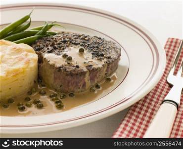 Filet Mignon au Poirve&acute; with French Beans and Pomme Anna