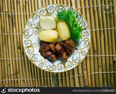 Filipino Braised Pork Adobo.pork cooked in soy sauce, vinegar, and garlic