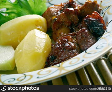 Filipino Braised Pork Adobo.pork cooked in soy sauce, vinegar, and garlic