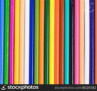 Filled frame of colorful wooden pencils.