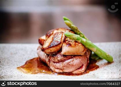 Fillet mignon steak with Foie Gras and spring asparagus Japanese Teppanyaki dining style