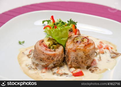 fillet trout fish with baked vegetables and mushroom sauce