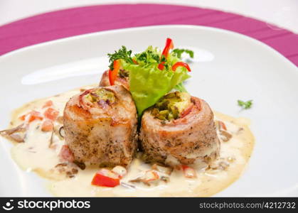 fillet trout fish with baked vegetables and mushroom sauce