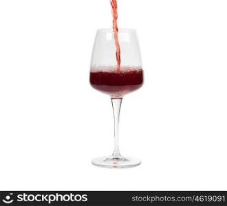 Filling a wine glass isolated on a white background