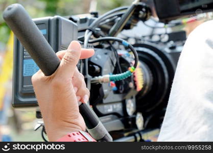 Film industry. Filming with professional camera background