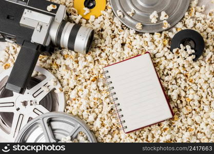 film reel camcorder camera with spiral notepad popcorns