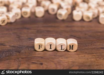 film word written wooden cubes