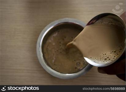 Filter coffee being poured into a dabarah